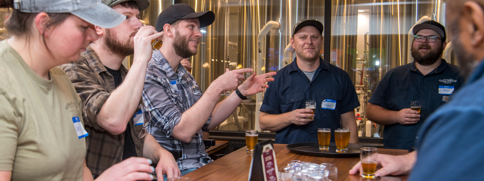 Students and instructor tasting beer